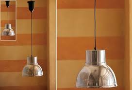 Similar in design to chandeliers, pendant lights hang lower from the ceiling and can be used independently or in clusters. Allume Retractable Light Adjustable Lighting Hanging Lights Lighting