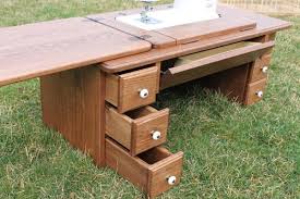 The 'seamstress' is the ultimate sewing machine cabinet. Amish Treadle Sewing Cabinet Singer Janome 712t Machines