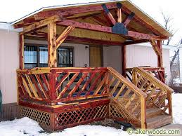 Cedar porch columns,cedar porch post ideas,cedar porch post wraps,cedar post for front porch,how to build cedar porch columns. Aker Woods Producers Of House Logs Peeled Posts Milled Timbers Log Siding Flooring Paneling Other Wood Products