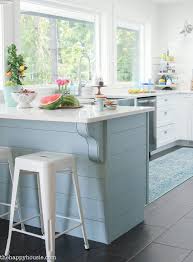 Set onto natural oak gray floors and white. 15 Gorgeous White Kitchens With Coloured Islands The Happy Housie