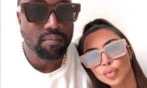 Kim Kardashian twins with hubby Kanye West in pairs of 'Millionaire' Louis  Vuitton sunglasses | Daily Mail Online