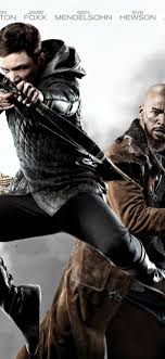 Robin hood es una película estadounidense de acción y aventura de 2018 dirigida por otto bathurst y escrita por joby harold, peter craig y david james kelly, basada en la leyenda de robin hood. Robin Hood 2018 1242x2688 Iphone 11 Pro Xs Max Wallpaper Background Picture Image