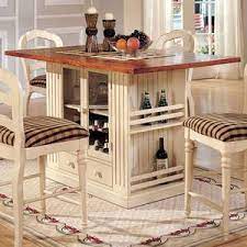 Furniture of america newrock 7 piece faux marble dining table set. A Storage Kitchen Island And Dining Table In One With A Beautiful White Painted Fin Kitchen Island Table Kitchen Island With Seating Kitchen Table With Storage