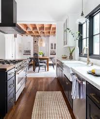 Modern Spanish By Colossus Before After White Marble Countertops Black Kitchen Cabinets Kitchen Decor Trends