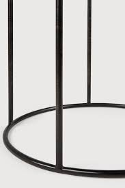 While the tray table may serve its function as a table, the versatile piece transforms to a moveable singular tray when removed from its structure. Fbd Iko9bfol1m