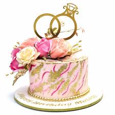 I believe with every celebration, the art stays with us, in our. Engagement Ring Cake 8