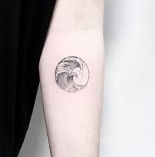 Wave tattoo designs japanese art wave tattoos such as this one will cover your arm or your bicep with ease. Three Japanese Waves On Circle Frame Forearm Tattoo Amazing Tattoo Ideas