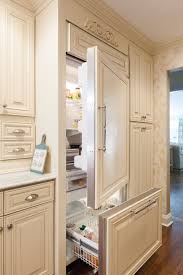 J K Cabinetry Traditional Cabinets Made From Maple Wood In A Creme Glazed Finish Style A7 Panel Ready Refrigerator Luxury Kitchens Traditional Cabinets