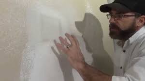 To repair a large hole in textured drywall: How To Repair Drywall And Match Texture Diy Duke Youtube