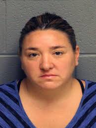 Monroe woman charged in theft of windows, doors