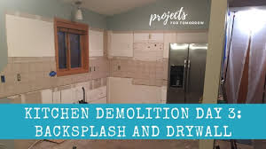 If the backsplash tile is installed properly using the proper tile adhesives for the material that you are tiling tile backsplash by: Kitchen Demolition Day 3 Backsplash And Drywall Projects For Tomorrow