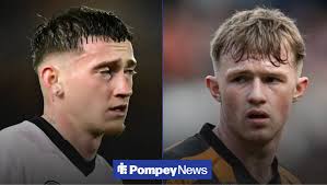 Louie Barry and Joe Gelhardt sign