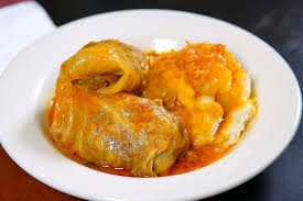 Bizarre Emil Cabbage Cabbage Rolls From Emil S Lounge Are Stuffed With A Mixture Of Pork Beef Rice And Oni Delicious Destinations Bizarre Foods Cabbage Rolls