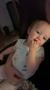 Winnie loves her plain popcorn while we watch a movie. ❤️ Little moo wants  an extra piece lol.