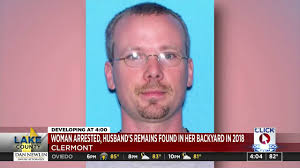 Clermont woman arrested 2 years after husband's remains found buried in her  backyard