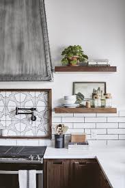 To add contrast, i went with white marble countertops on the wood island, and brazilian black granite countertops for the surrounding white cabinetry. The Ramsey House From Fixer Upper Scene Therapy