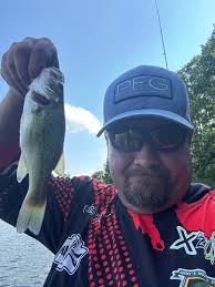 Catching bass near cypress trees