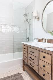 Many fixer upper fans may recall how the hit hgtv show inspired the shiplap trend—which may explain why tiffany brooks adds this design flourish to her latest renovation on 50k three. 13 Best Bathrooms By Joanna Gaines Nikki S Plate Amazing Bathrooms Bathroom Top Bathroom Renovations