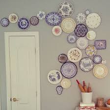 It might be photos, it might be degrees or it might be art, but one thing that just. Diy Hanging Plate Wall Designs With Fine China Fancy Plates Plates On Wall Wall Design Hanging Plates