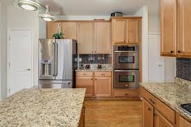 Santa cecilia granite with oak cabinets. New Venetian Gold Granite Countertops Elegance Gold Granite Stone Application Design