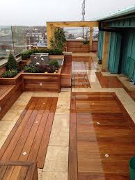 30 Outstanding Backyard Patio Deck Ideas To Bring A Relaxing Feeling Rooftop Design Patio Design Patio Flooring