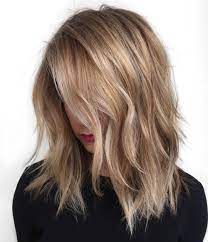 For an edgier look, go for a short sides long top. 40 Styles With Medium Blonde Hair For Major Inspiration