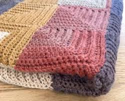 The first square cast on becomes one of the four corners of the afghan where four more squares are picked up and knit one after another. Continuous Mitered Square Crochet Afghan Pattern Petals To Picots