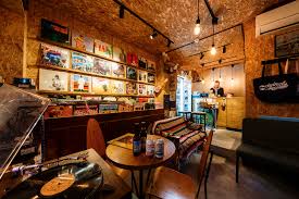 The space is kitted out with sleek wooden furniture and stylish hanging lightbulbs. Best Record Stores With Bars In Tokyo Vinyl Record Shop Vinyl Cafe Vinyl Record Store