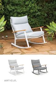 Built From White Aluminum Padded With A Thick Weather Resistant Seat And Set Atop Sleek Teak W Modern Outdoor Lounge Chair Lounge Chair Outdoor Rocking Chair