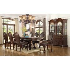 Putting large, heavy furniture into a small room will make it feel cramped, while choosing light and airy styles can make a big room seem empty. Campania 10 Piece Extendable Dining Set Formal Dining Room Furniture Sets Traditional Formal Dining Room Formal Dining Room Furniture