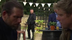 Aaron catches Robert and Kev in Emmerdale as they share a kiss