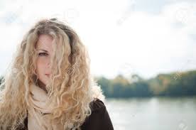 One thing that her followers often wonder, is why she chooses to cover her right eye. Portrait Of Young Woman With Blond Hair Covering One Eye Outdoor With Copy Space Stock Photo Picture And Royalty Free Image Image 11549533