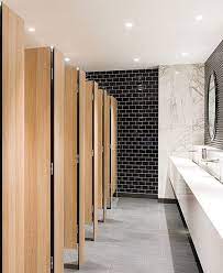 Metpar's stone toilet partitions are available in marble and granite stones. Subway Tiles Cement Ish Floor Black And White Theme Not Sure About Wood For The Cubicle Partitions Washroom Design Restroom Design Public Bathroom Design