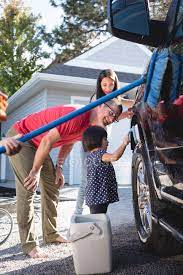 The new riva diamond tail handplane by garage handplanes is put through its paces by don mccredie. Father And Kids Having Fun While Washing Car Outside Garage Interacting Automotive Stock Photo 209275786