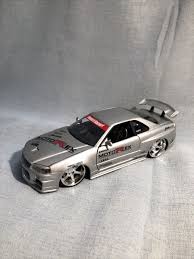 Jada Toys 1:24 Import Racer Nissan Skyline R34 GTR Gray Do Luck MotoRex  53944 | eBay