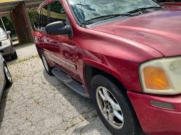 Image result for Red 2003 Envoy