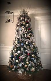 Santa S Best Christmas Tree 9 Lights Turned Off On Champagne Blue And Burgundy Decor Blue Christmas Tree Christmas Tree Decorations Cool Christmas Trees