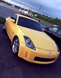 yellow 350z nissan 350z honda civic si mitsubishi lancer evolution