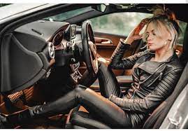 blonde leather lady in a supercar laurethdysiac leather outfit leather fashion leather