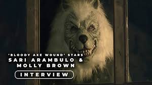 'Bloody Axe Wound' Stars Sari Arambulo and Molly Brown On Their New Meta  Slasher