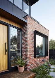 This is what it looked like before we. Black Brick House With Wood Novocom Top
