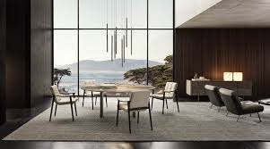 The table can significantly convert in length and height. Linha Dining Tables En