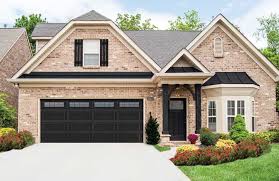 50 Best Exterior Paint Colors For Your Home Black Garage Doors Garage Door Colors Carriage Garage Doors