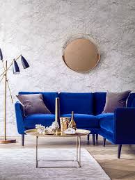 The Holly S Retro Inspired Shape Is A Nod To The Sleek And Curvy Mid Century Style The Blue Velvet Blue Corner Sofas Blue Couch Living Room Living Room Decor