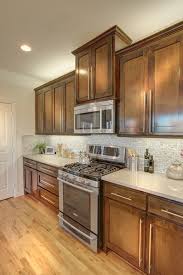 Pecan Wood Kitchen Cabinets Pecan Park Now Open In Mckinney Tx Kitchen Stove And Wood Cabinets Wood Floor Bathroom Wood Kitchen Island Custom Wood Furniture
