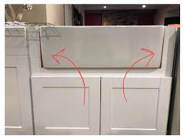 When you have a farmhouse sink, the faucet is mounted to the countertop, which means that instead of the mounting holes being in the sink, they'll actually be cut into your countertop. A Farmhouse Sink Ikea Kitchen Can You Have Both