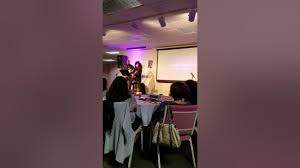 Jade Hendrix, grand-daughter the iconic Jimmy Hendrix, opens in song at a  seminar for Kirt Gonzales