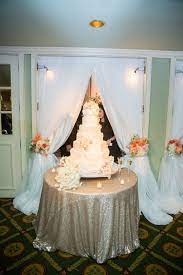 This Cake Wash By Beyond Helps This Sugar Masterpiece Stand Out At This Reception At The Adolphus Hotel In Dal Wedding Cake Table Wedding Linens Wedding Lights