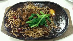 Sizzling yee mee is a recipe specially provided by an experienced cook of over 50 years. Sizzling Yee Mee With Egg Stock Photo Picture And Royalty Free Image Image 24371644