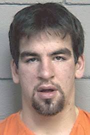 Man charged with kicking officer